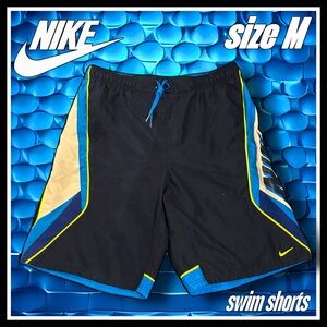 NIKE multi colored SWIM SHORTS size M